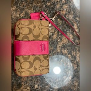 Coach wristlet. Classic print & pink
